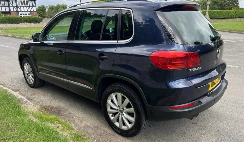 
								Volkswagen Tiguan 2.0 DSG full									